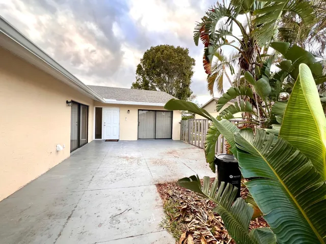 a view of backyard with green space