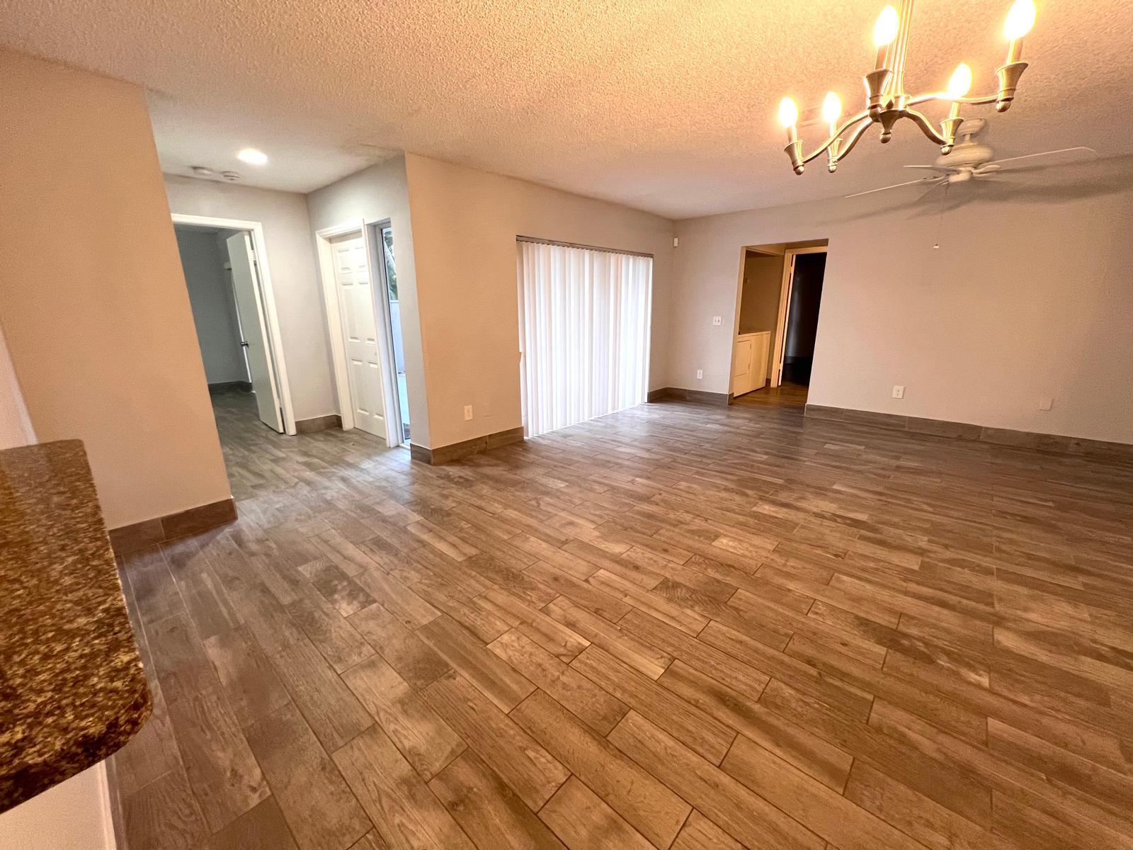 8113 Ambach Way, Unit 28A Hypoluxo, FL 33462 - Photo 6 of 20 a view of a livingroom with a staircase