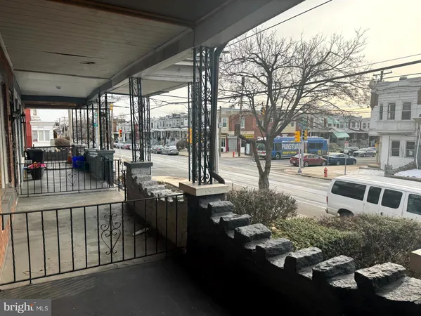 a swimming pool view with a outdoor seating
