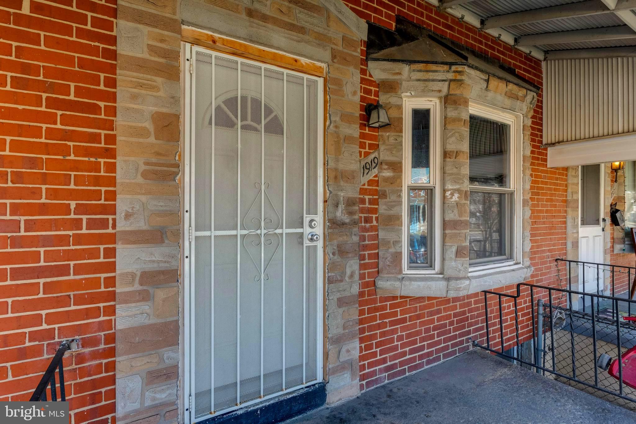 1919 Larkhall Road Dundalk, MD 21222 - Photo 1 of 23 a view of outdoor space with brick walls