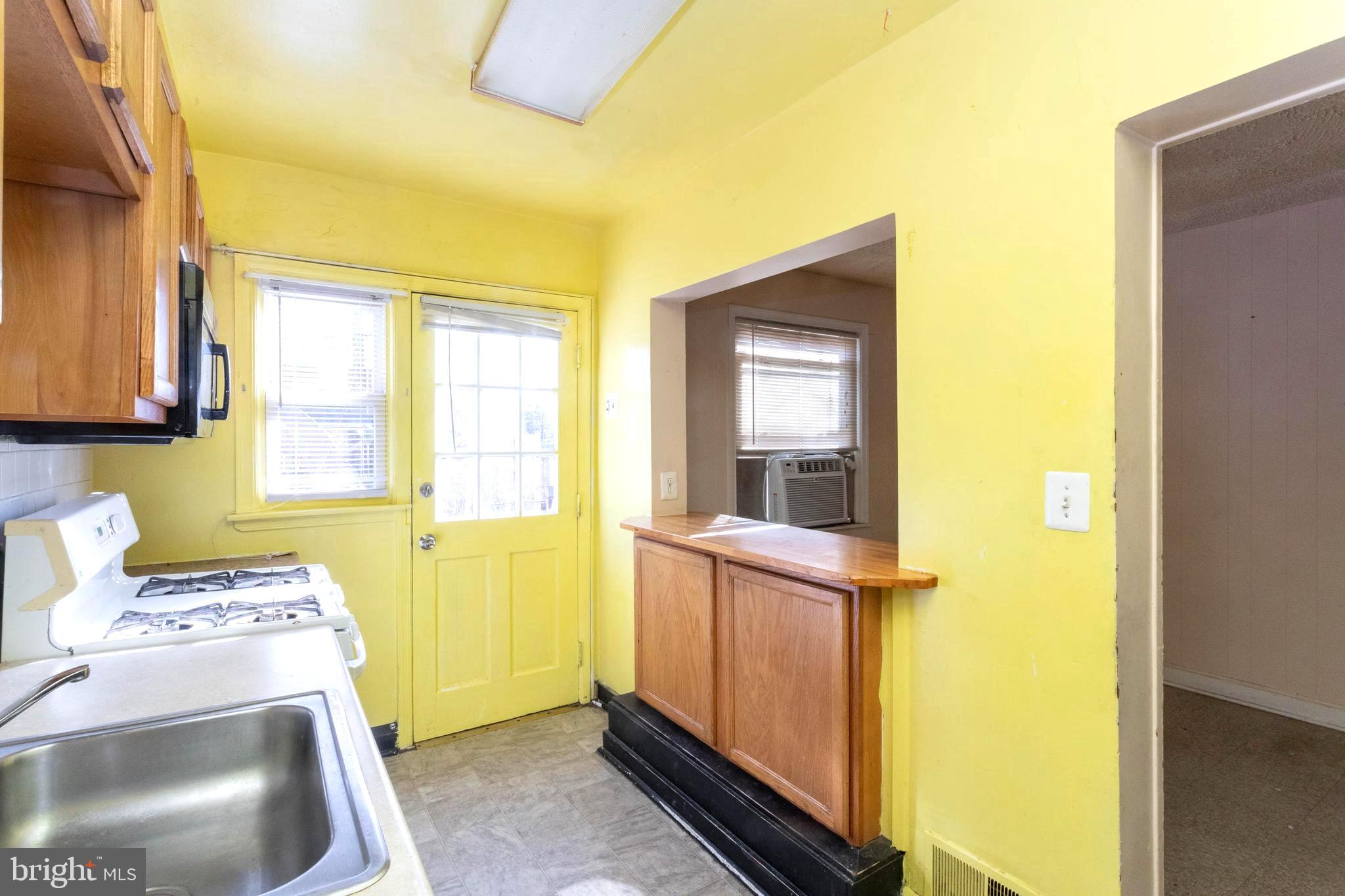 1919 Larkhall Road Dundalk, MD 21222 - Photo 11 of 23 a view of utility room with washer and dryer