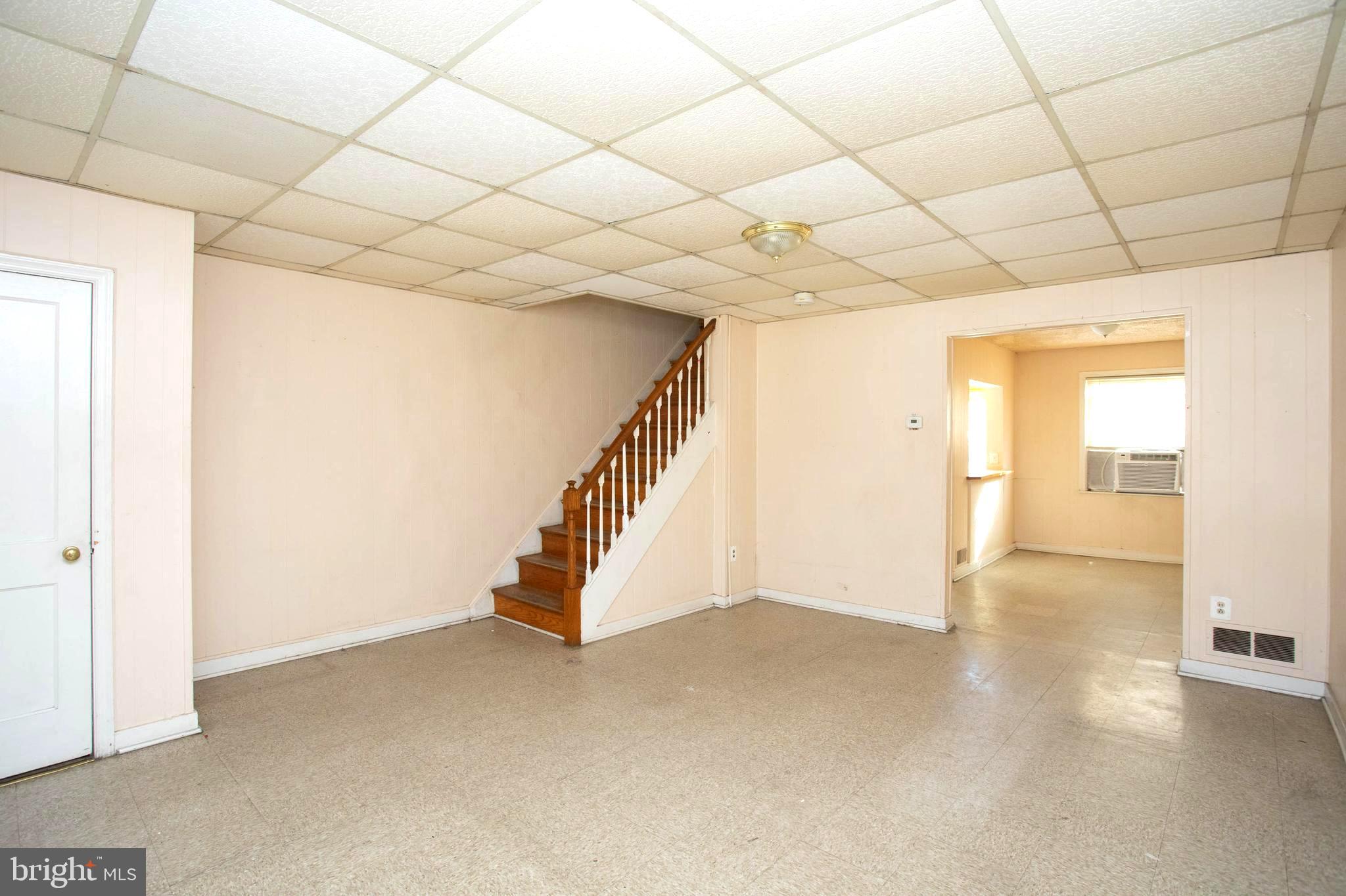1919 Larkhall Road Dundalk, MD 21222 - Photo 4 of 23 a view of a livingroom with a staircase