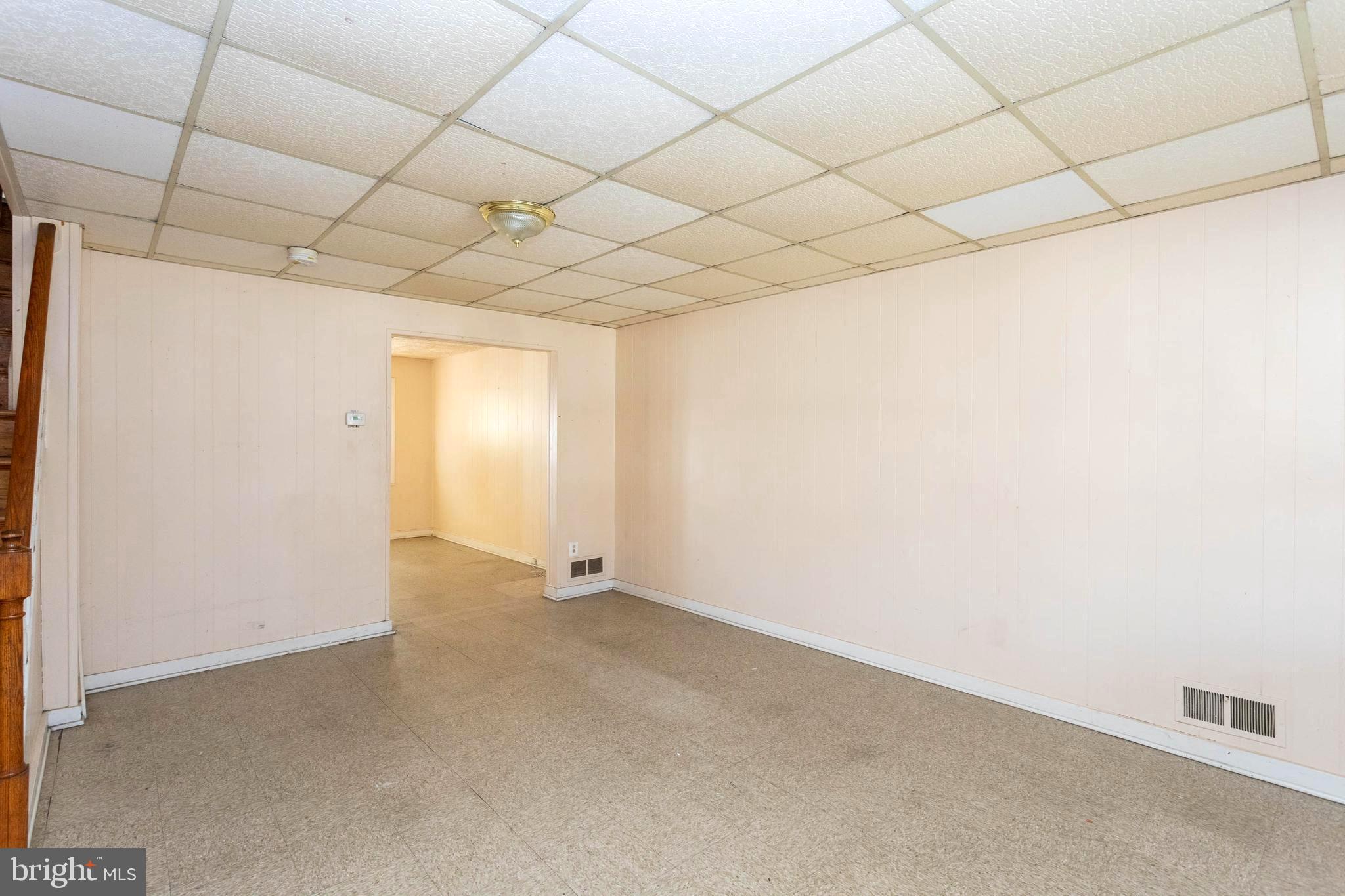 1919 Larkhall Road Dundalk, MD 21222 - Photo 5 of 23 a view of an empty room with a window