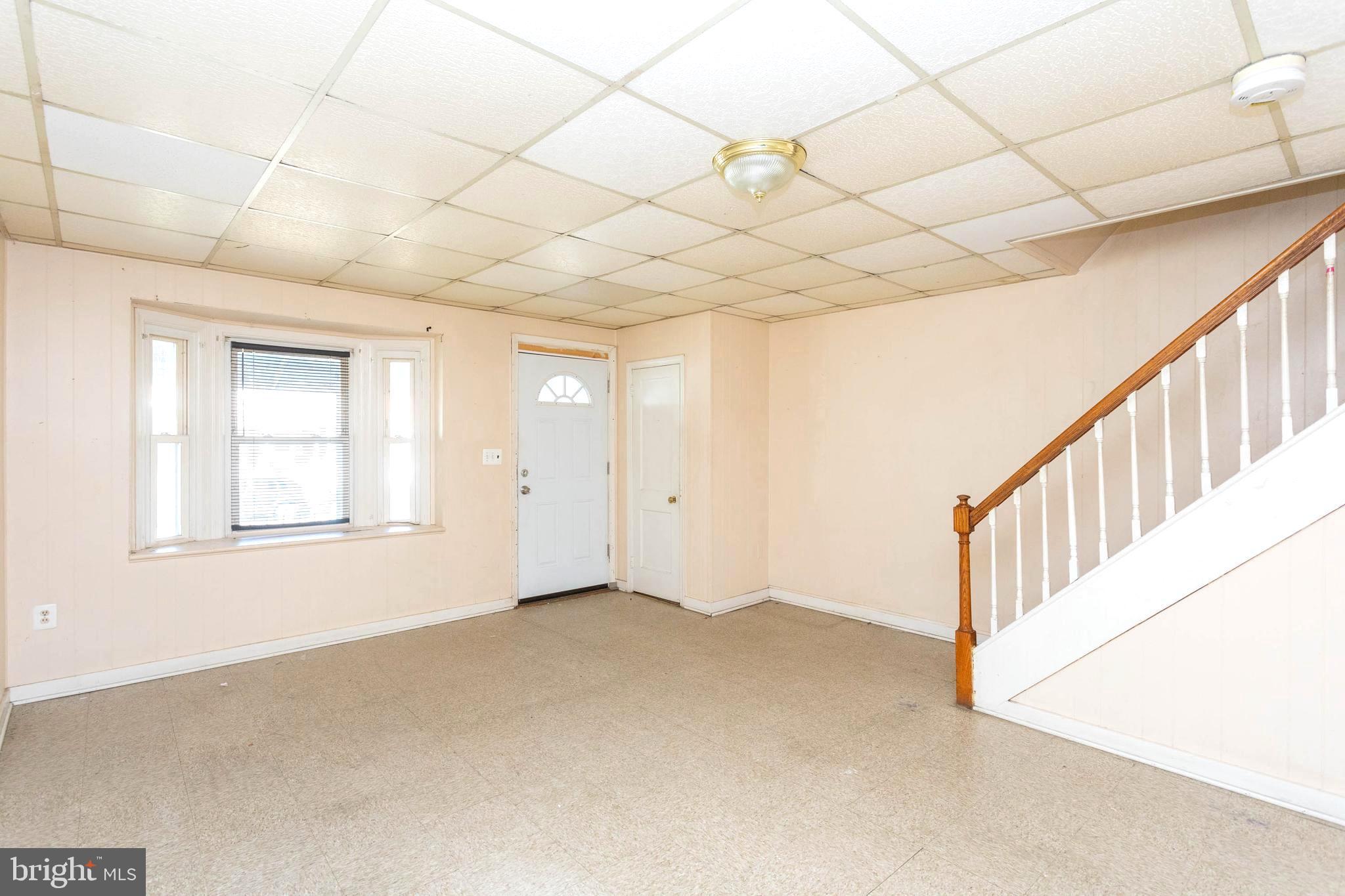 1919 Larkhall Road Dundalk, MD 21222 - Photo 7 of 23 a view of an empty room with a window