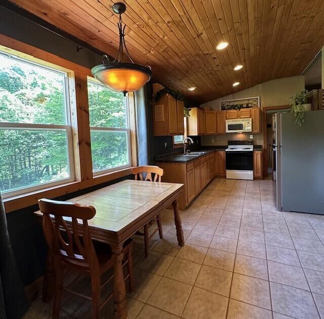 7751 Mulberry Road Heath, OH 43056 - Photo 15 of 70 A WARM COUNTRY KITCHEN WITH CERAMIC TILE FLOOR AND KNOTTY PINE CEILING