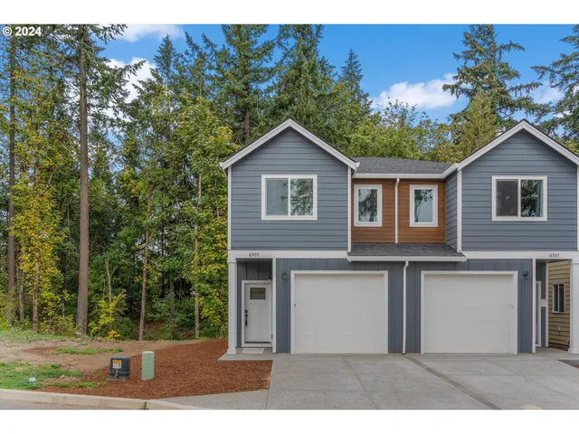 a house view with a garden space