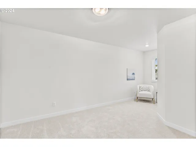 a room with a white wall