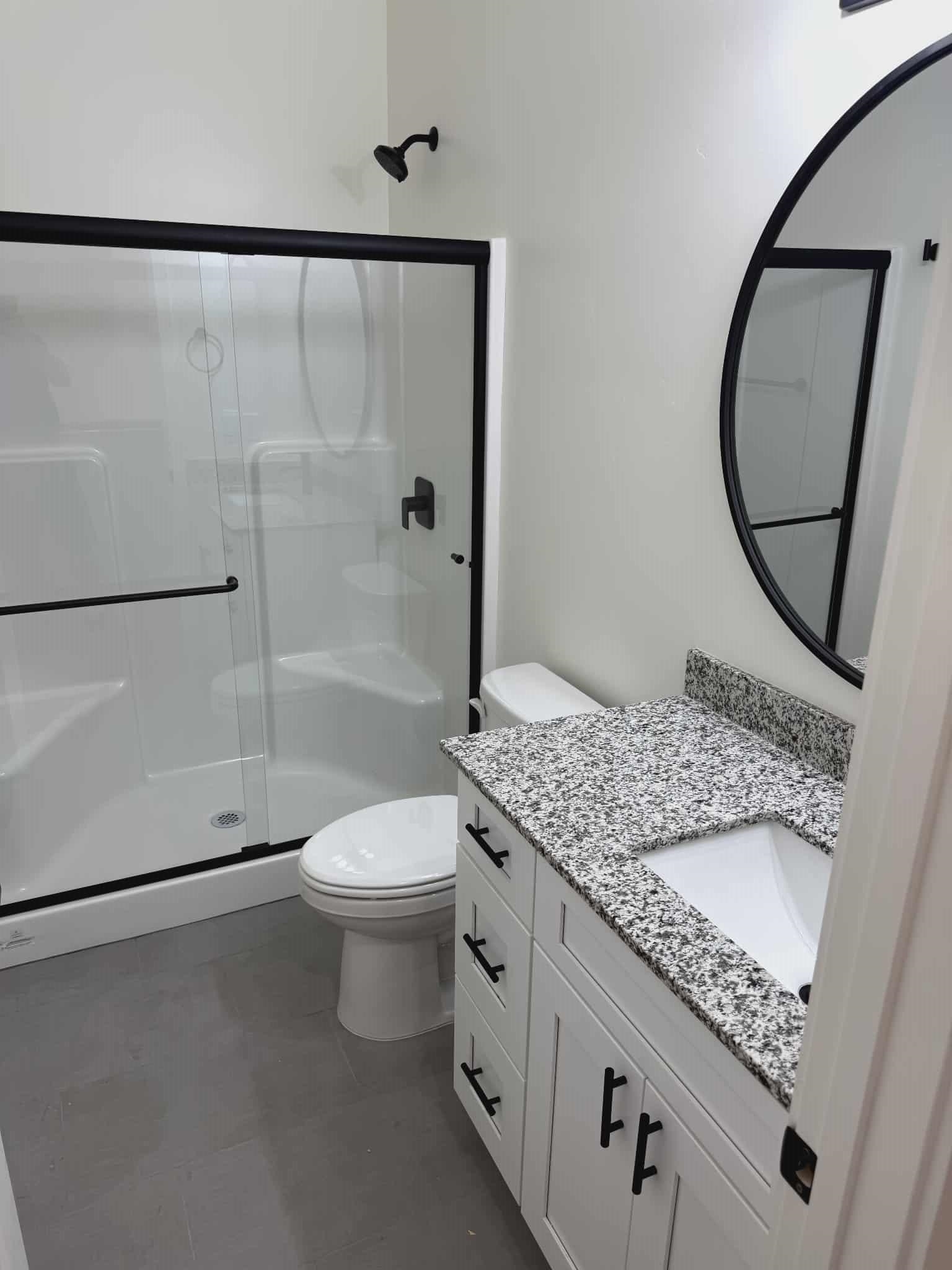 512-28 28 3/4 Road Grand Junction, CO 81501 - Photo 8 of 20 a bathroom with a granite countertop sink toilet and shower