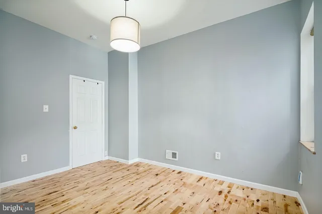 a view of a room that has a window in it