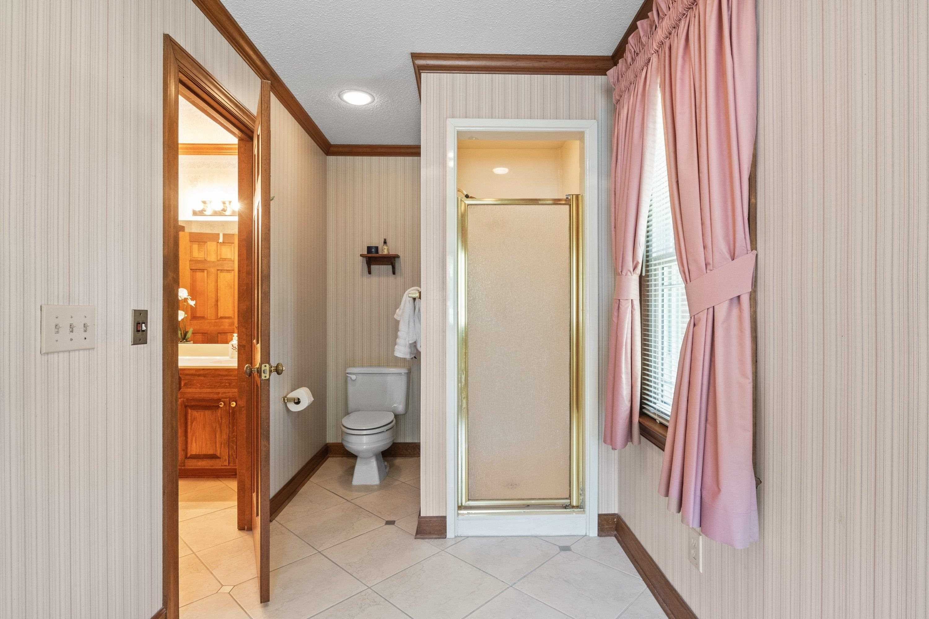 8501 Crowder Road Raleigh, NC 27603 - Photo 39 of 60 Separate room with separate shower and garden tub Primary Bath