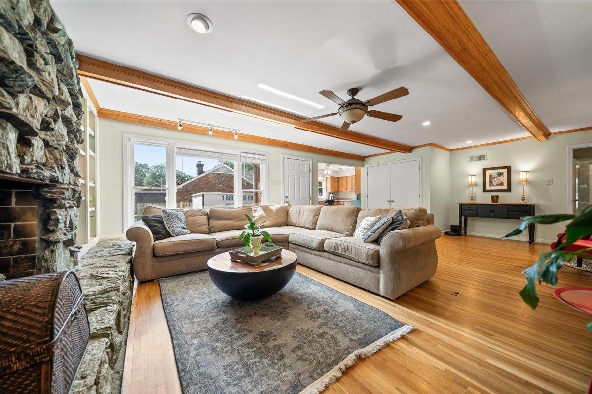 4847 Kaye Road Memphis, TN 38117 - Photo 21 of 40 a living room with furniture a fireplace and a large window