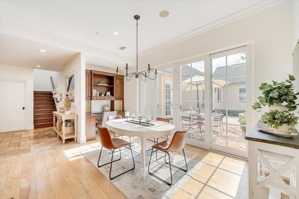 32110 Dos Ninas Bonsall, CA 92003 - Photo 15 of 75 a view of a dining room with furniture window and wooden floor