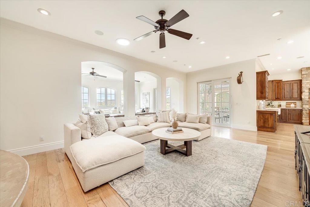 32110 Dos Ninas Bonsall, CA 92003 - Photo 19 of 75 a living room with furniture and a large window