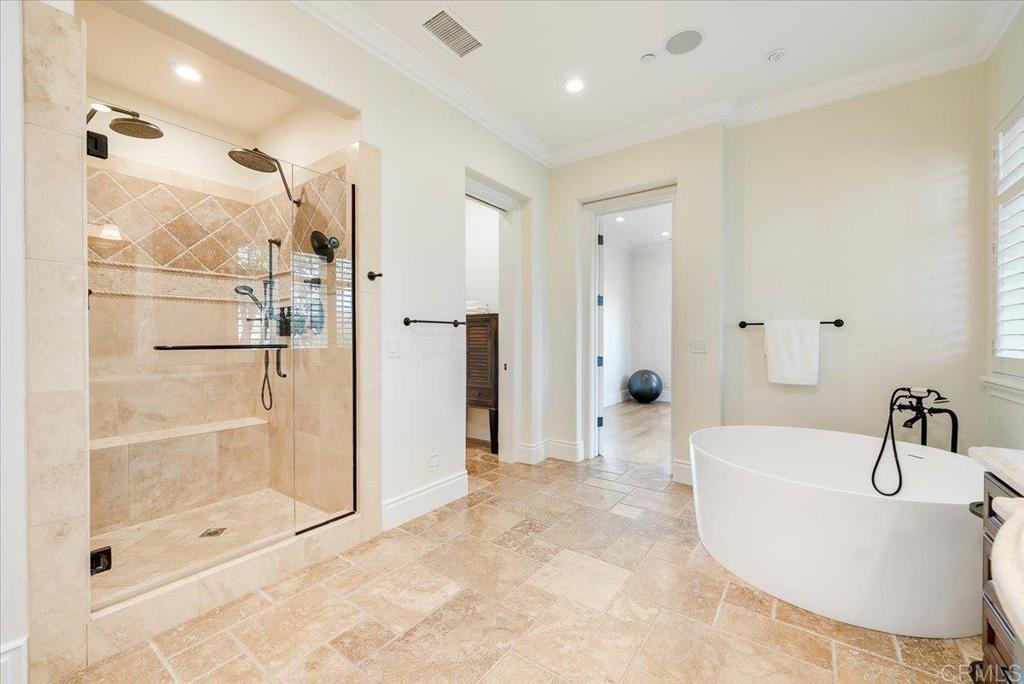 32110 Dos Ninas Bonsall, CA 92003 - Photo 28 of 75 a bathroom with a sink a toilet and shower