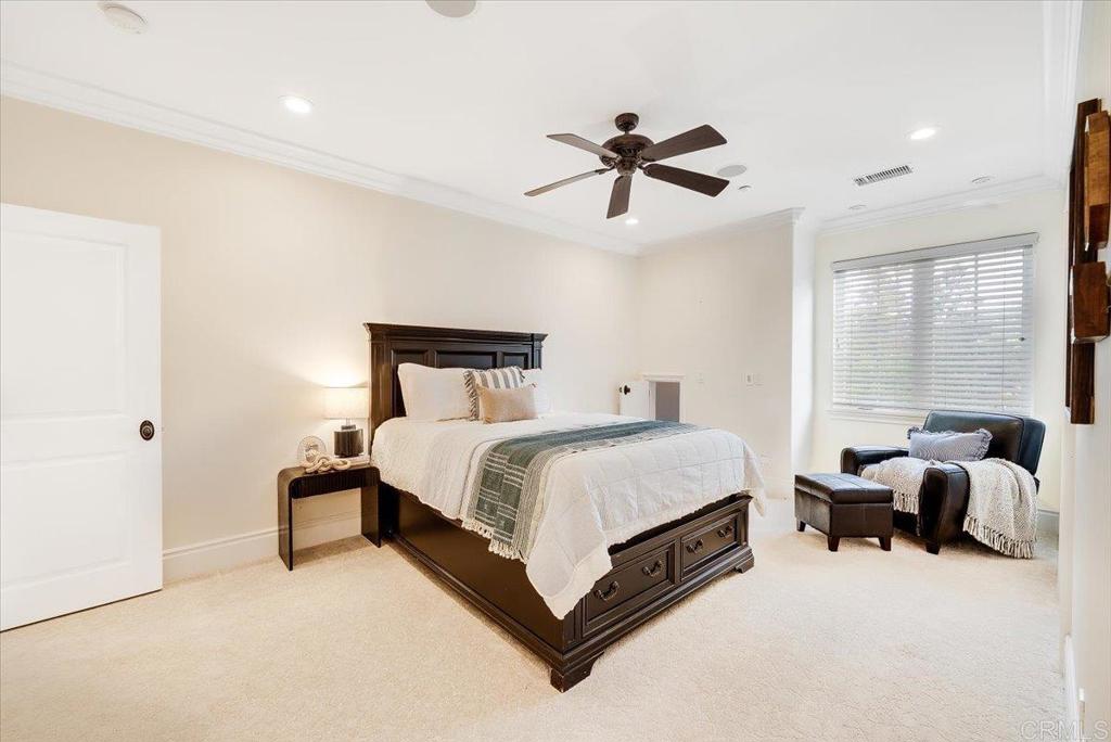 32110 Dos Ninas Bonsall, CA 92003 - Photo 37 of 75 a bed room with a bed and a chandelier