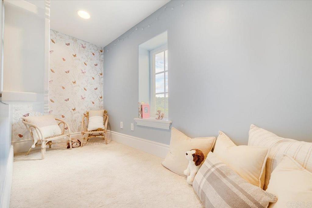 32110 Dos Ninas Bonsall, CA 92003 - Photo 38 of 75 a bed room with a bed and a chair