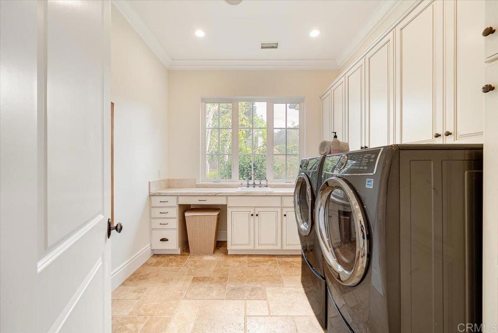 32110 Dos Ninas Bonsall, CA 92003 - Photo 46 of 75 a utility room with sink dryer and washer