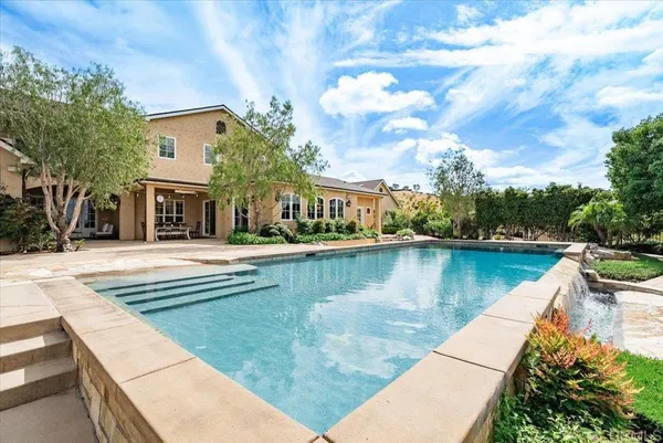 a view of a balcony with a pot
