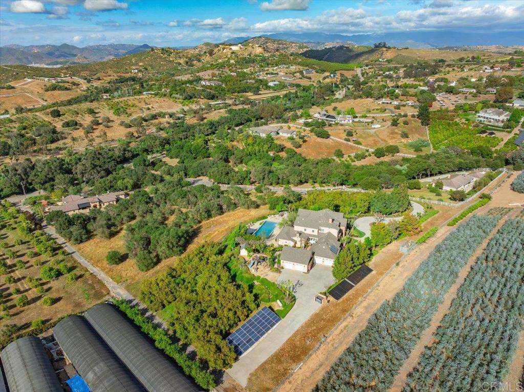 32110 Dos Ninas Bonsall, CA 92003 - Photo 65 of 75 an aerial view of residential houses with outdoor space