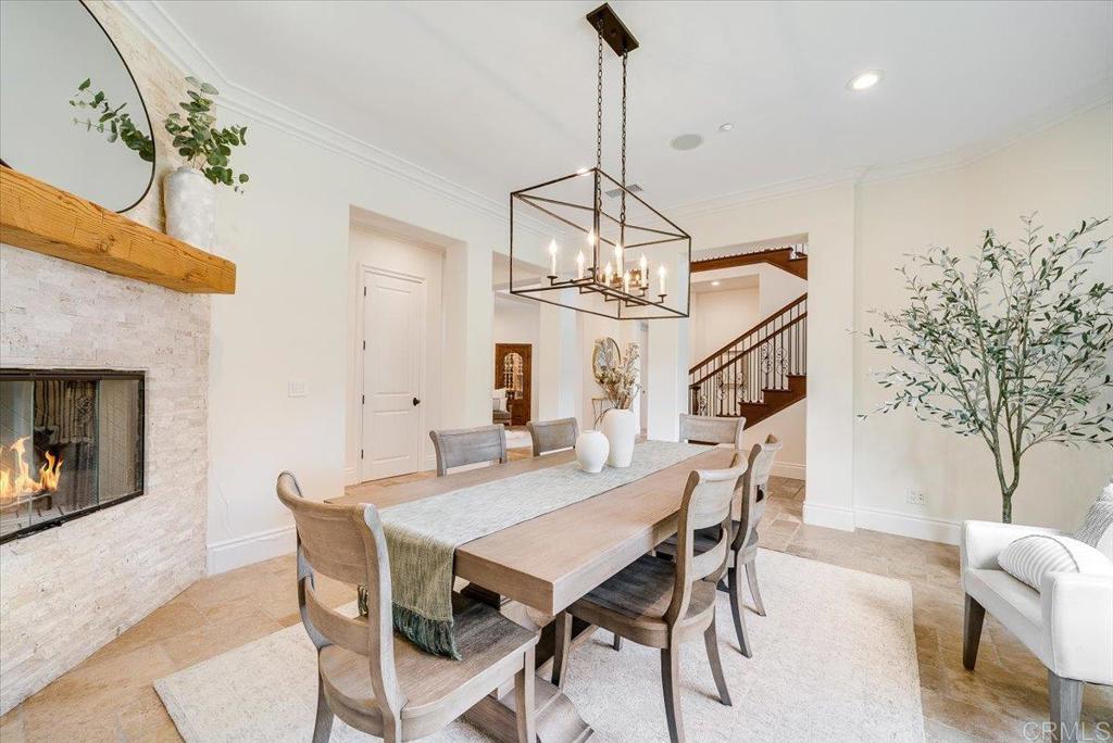 32110 Dos Ninas Bonsall, CA 92003 - Photo 7 of 75 a view of a dining room with furniture wooden floor and chandelier