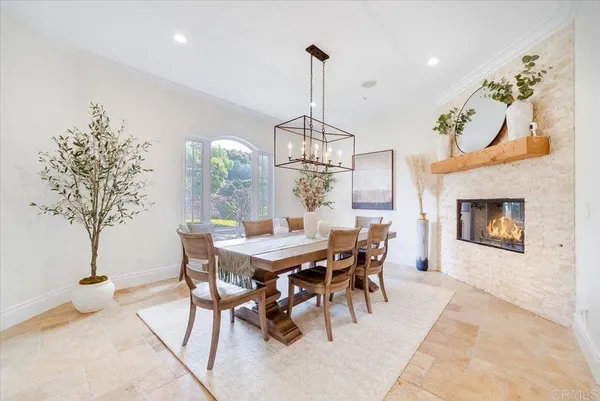 a kitchen with stainless steel appliances granite countertop a stove and a refrigerator