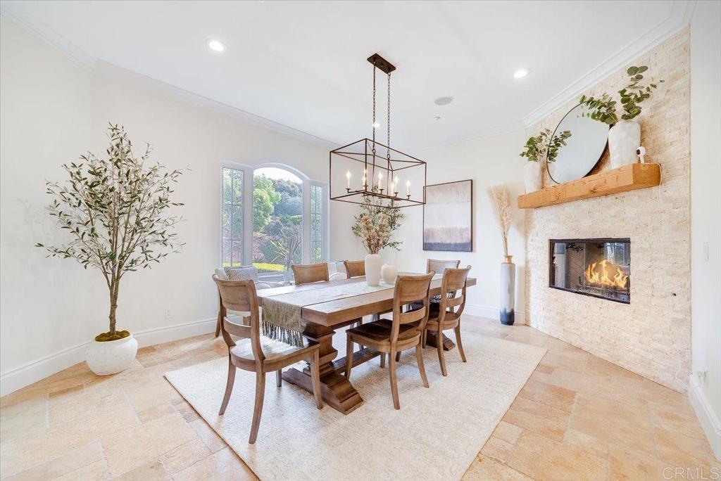 32110 Dos Ninas Bonsall, CA 92003 - Photo 8 of 75 a view of a dining room with furniture window and chandelier
