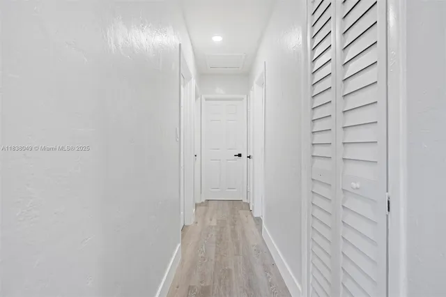 a view of hallway with stairs