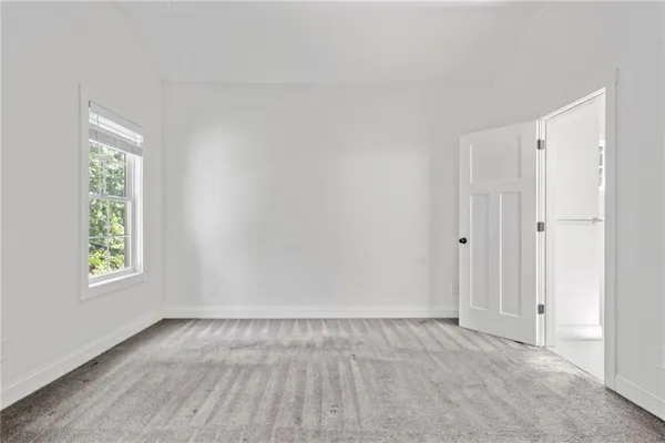 a bathroom with a shower and a sink