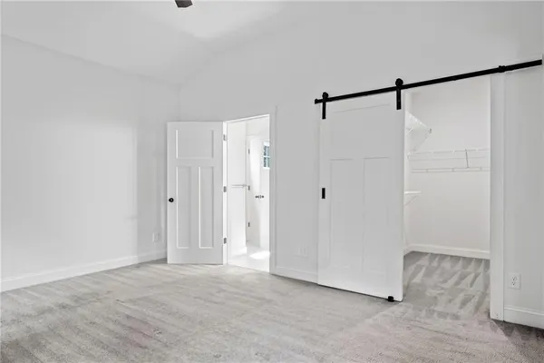 a bathroom with a double sink shower and a mirror