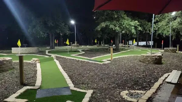 a view of a park with swings