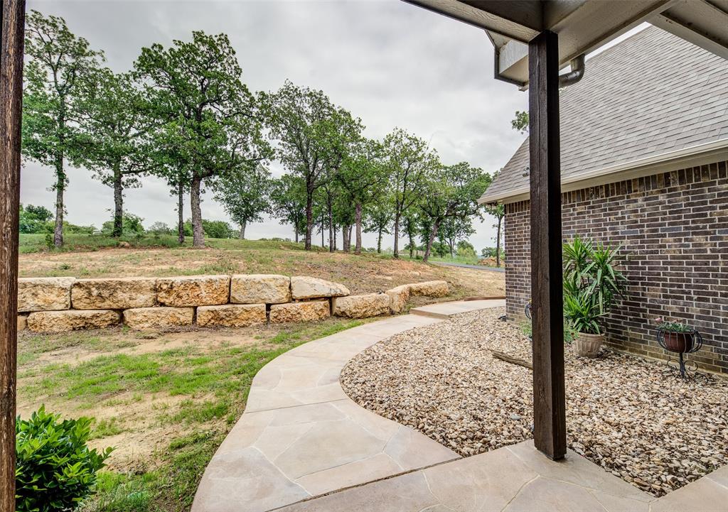 133 Sunset Bay Pointe Court Chico, TX 76431 - Photo 38 of 40 View of yard