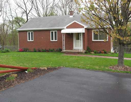 Exterior Front. Welcome to 3062 Clay Pike!  Located in Yough School District.  Solid Red-Brick 3 Bedroom 1 Bath Ranch Home.  Home sits on .5 of an acre, is fenced, and is backed by woods.