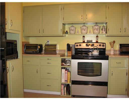 3062 Clay Pike Rillton, PA 15678 - Photo 9 of 18 Kitchen. Kitchen offers plenty of storage! Stainless steel electric stove and oven, pantry unit to hold microwave and dry goods, refrigerator-included!