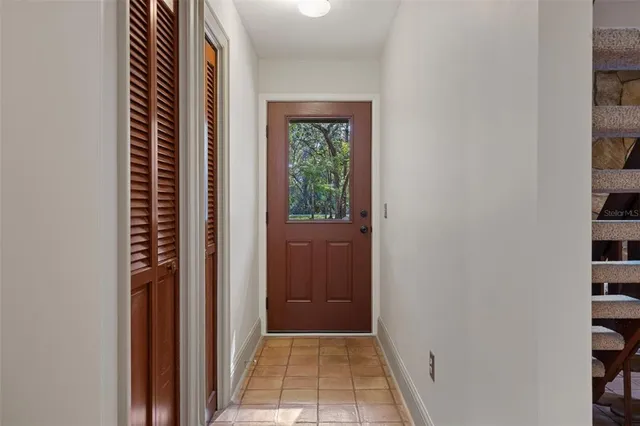 a kitchen with stainless steel appliances granite countertop a stove top oven a sink dishwasher and cabinets