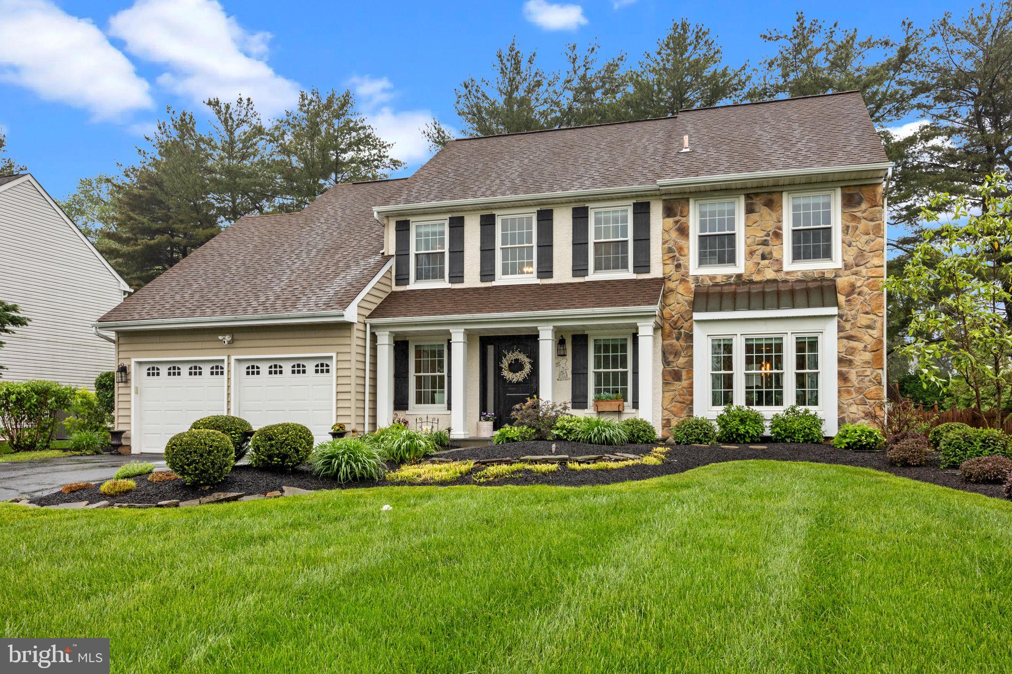 121 Beech Drive Hatboro, PA 19040 - Photo 1 of 46 a front view of a house with a yard and potted plants