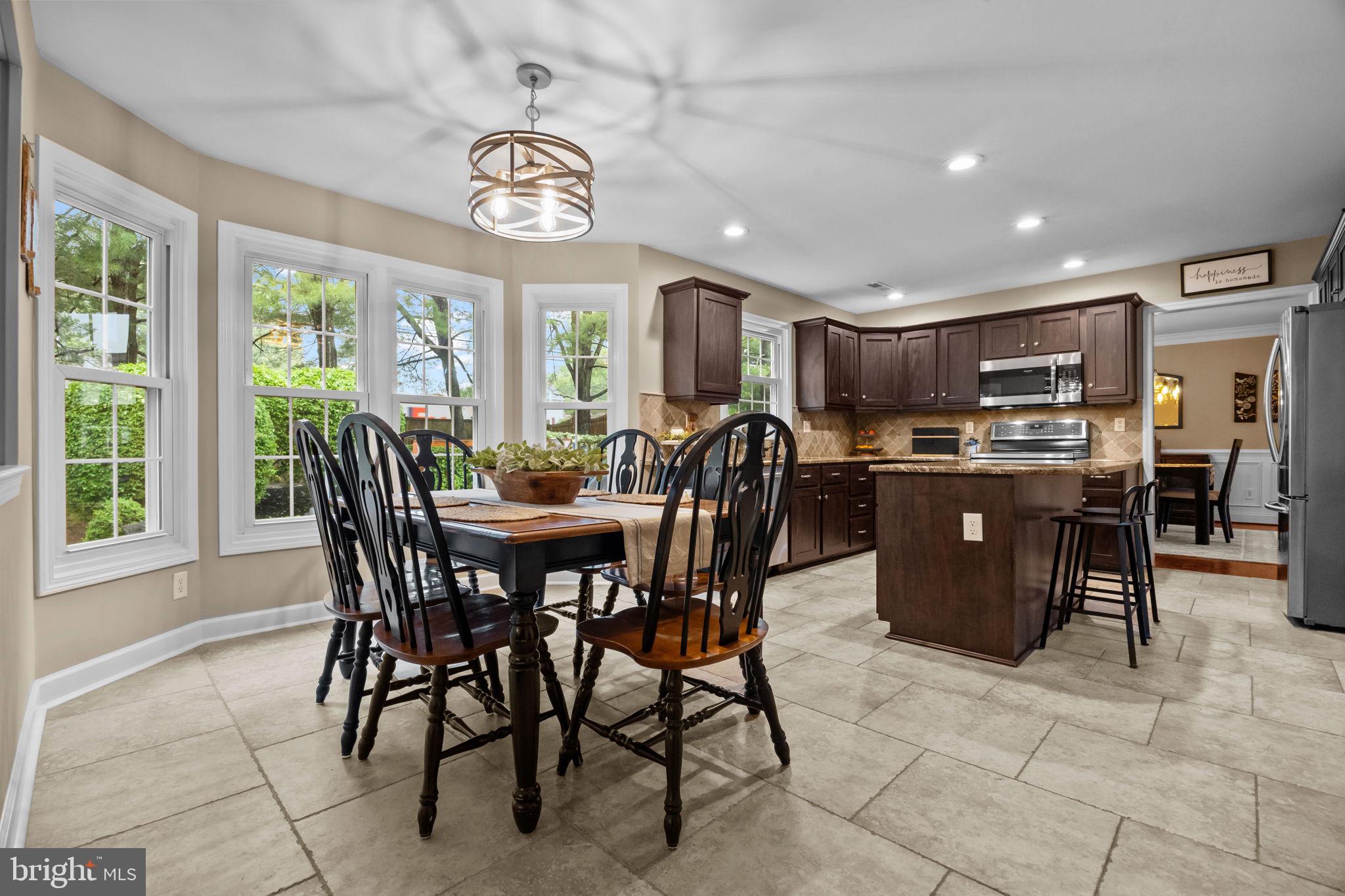 121 Beech Drive Hatboro, PA 19040 - Photo 11 of 46 a view of a dining room with furniture window and outside view