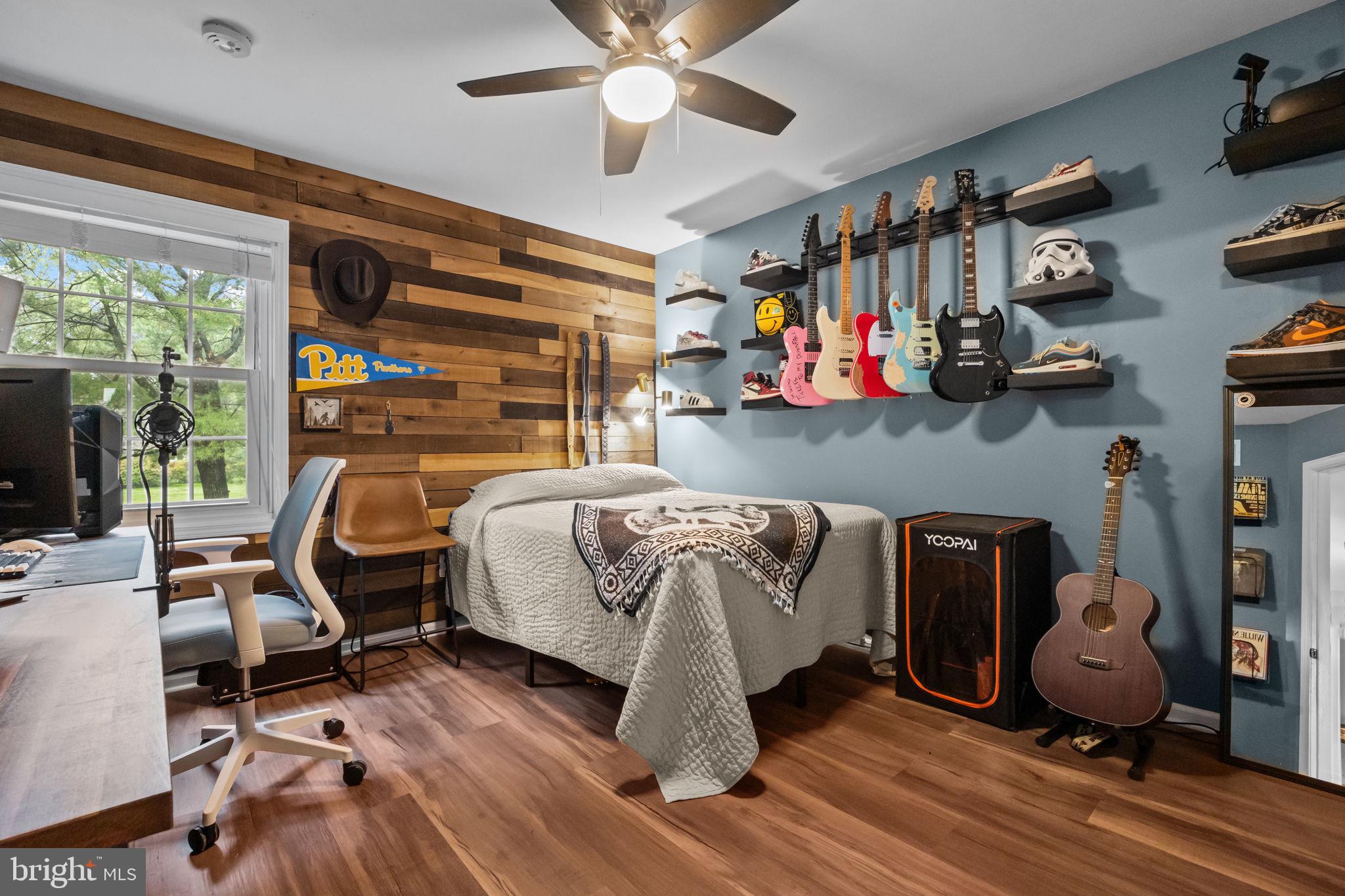 121 Beech Drive Hatboro, PA 19040 - Photo 22 of 46 a bed room with furniture and a floor to ceiling window