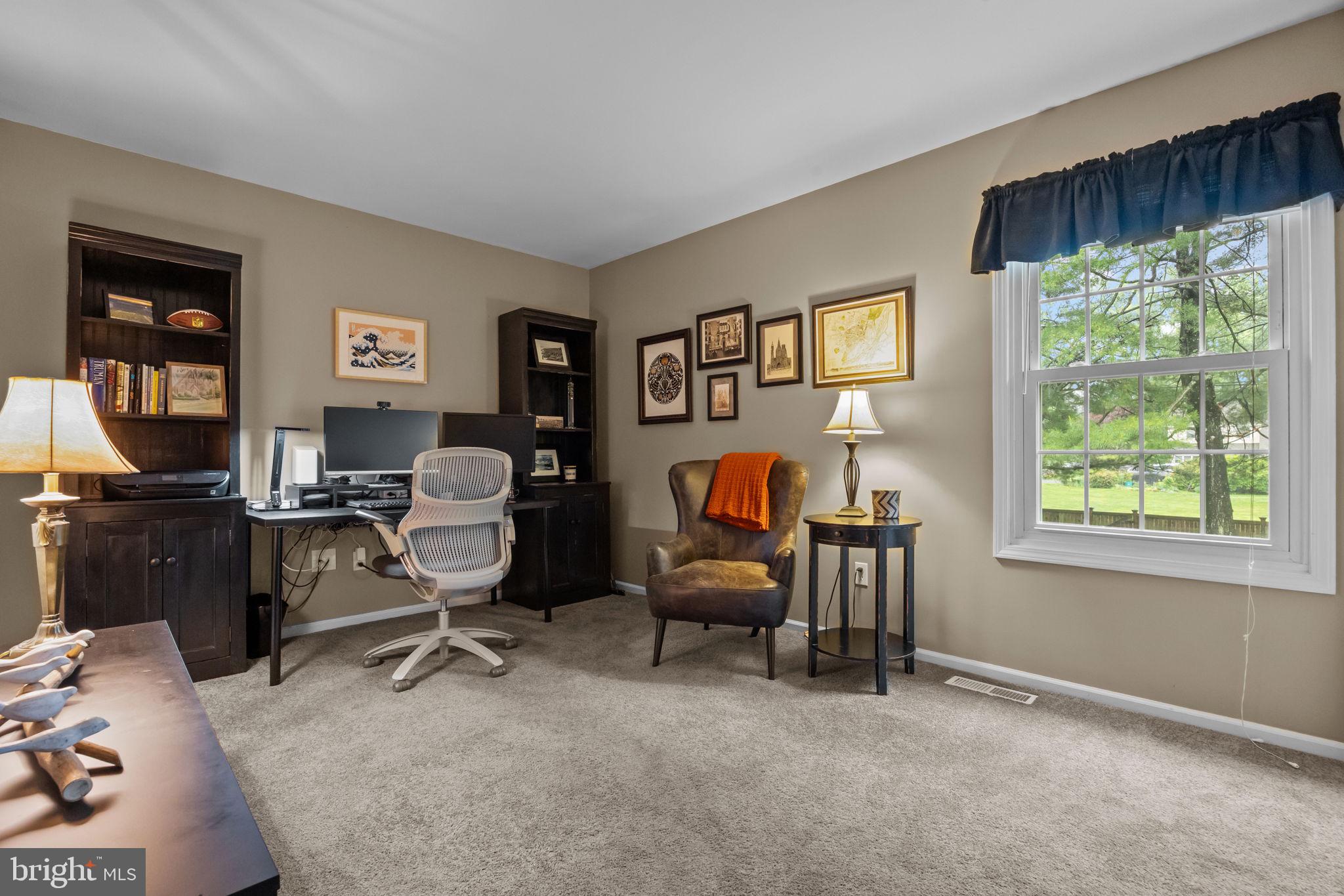 121 Beech Drive Hatboro, PA 19040 - Photo 23 of 46 a view of a livingroom with workspace and a window