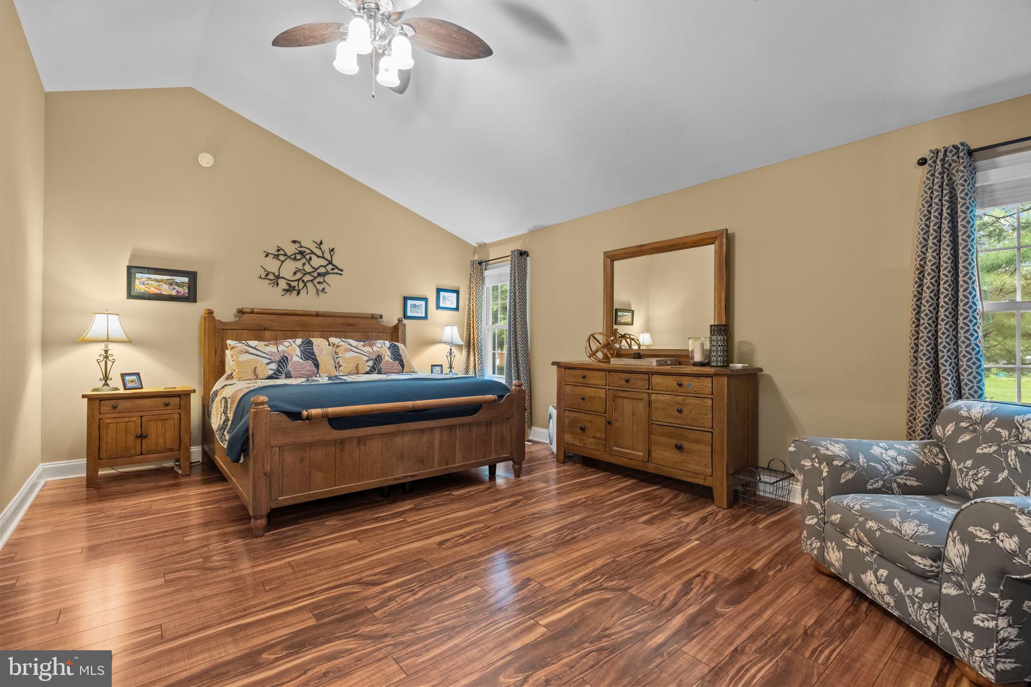 121 Beech Drive Hatboro, PA 19040 - Photo 25 of 46 a bedroom with a bed and a chandelier