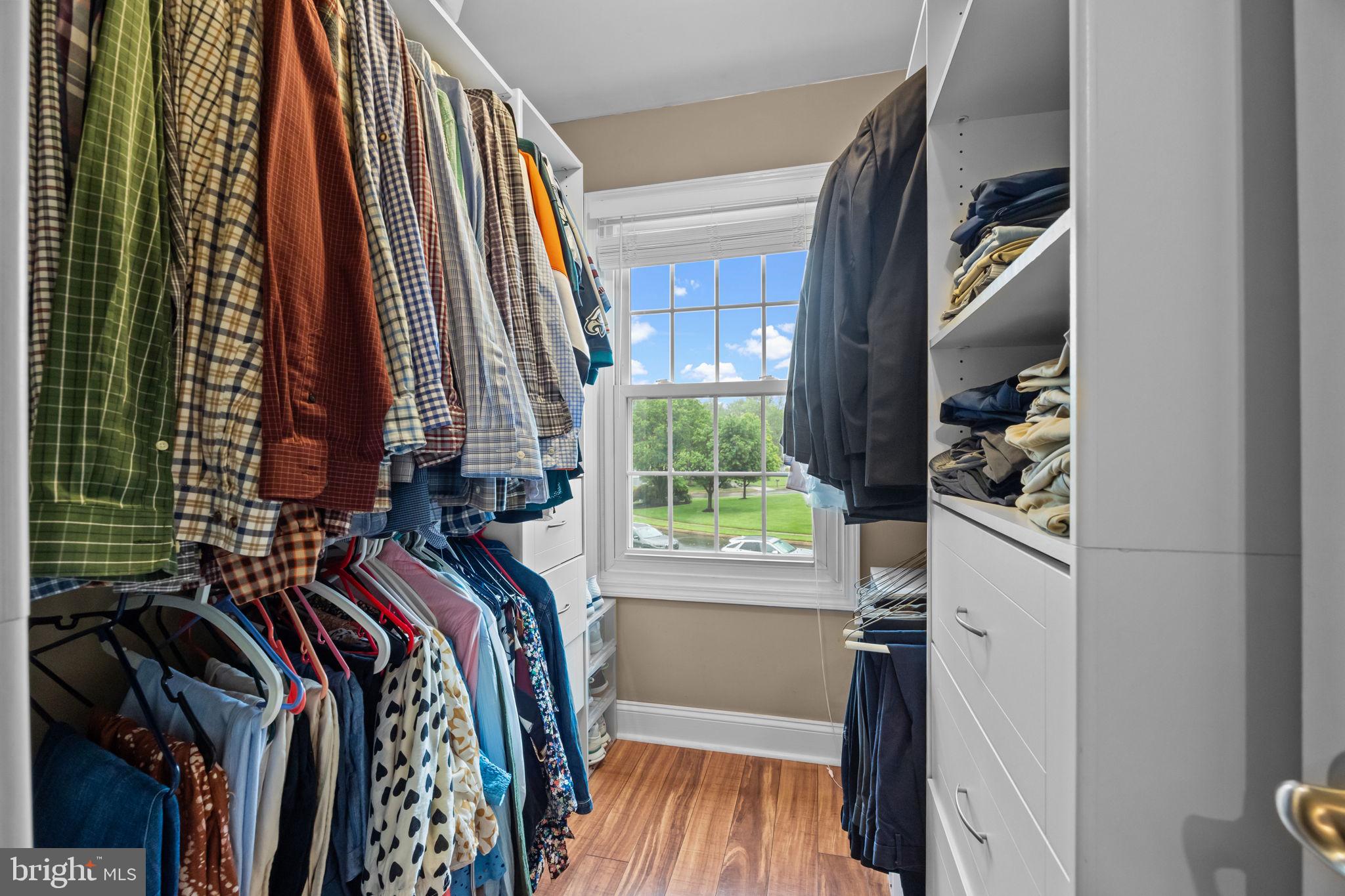 121 Beech Drive Hatboro, PA 19040 - Photo 31 of 46 a view of walk in closet with clothes and shoes