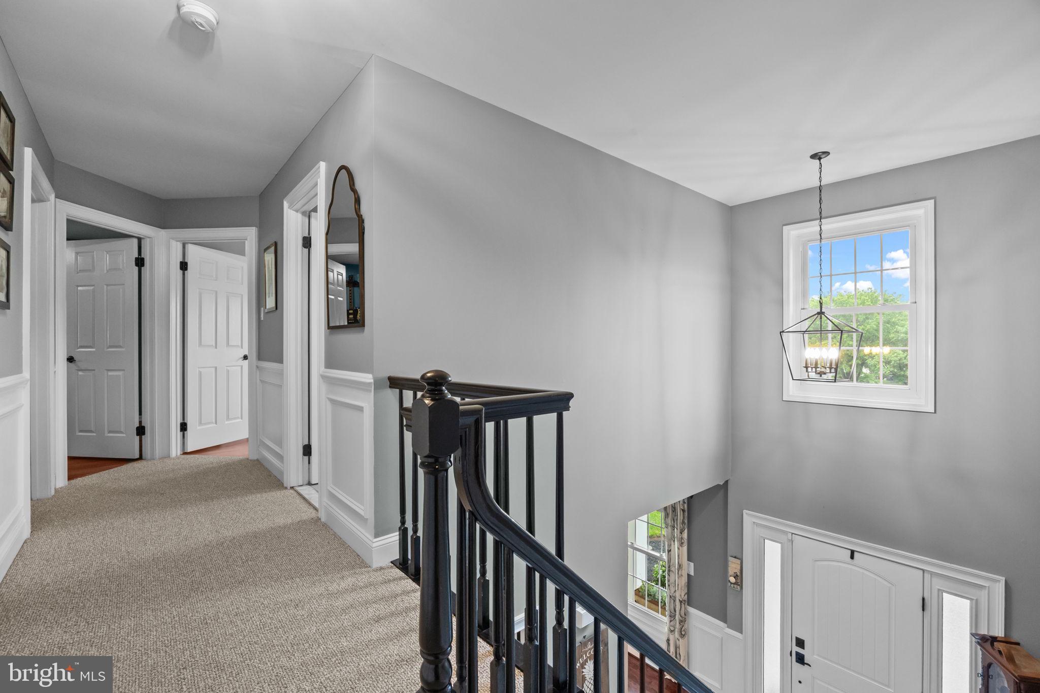 121 Beech Drive Hatboro, PA 19040 - Photo 32 of 46 a view of a hallway with entryway and stairs
