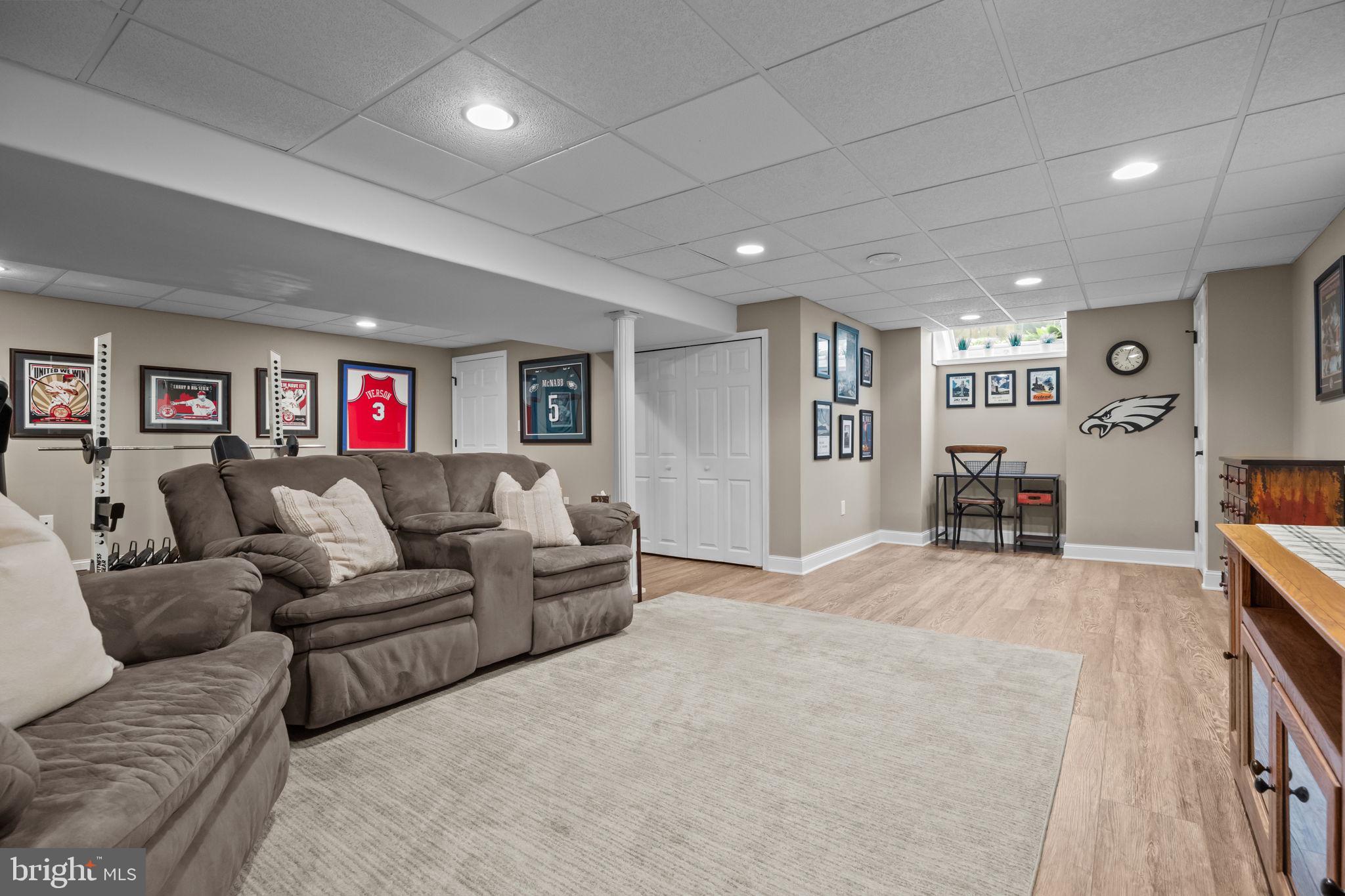 121 Beech Drive Hatboro, PA 19040 - Photo 34 of 46 a living room with furniture and a flat screen tv