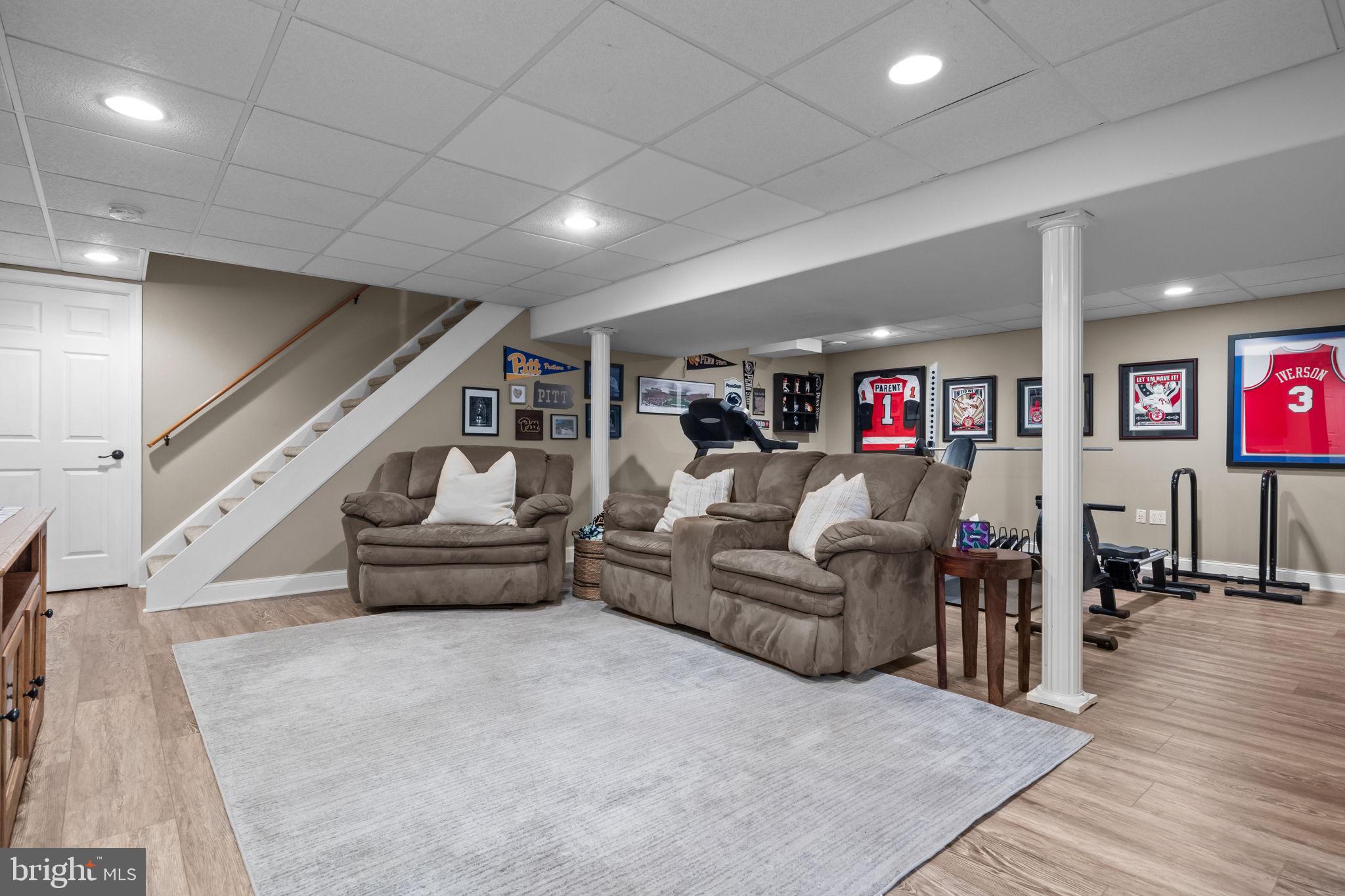 121 Beech Drive Hatboro, PA 19040 - Photo 35 of 46 a living room with furniture and a wooden floor