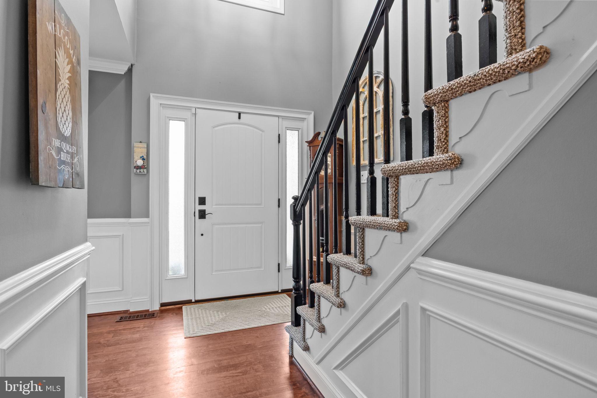 121 Beech Drive Hatboro, PA 19040 - Photo 5 of 46 a view of an entryway with wooden floor and door