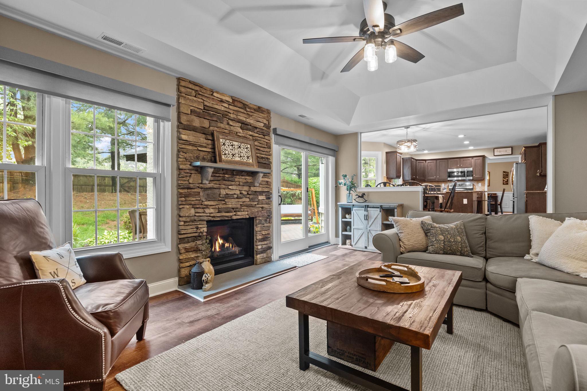 121 Beech Drive Hatboro, PA 19040 - Photo 10 of 46 a living room with furniture fireplace and a large window