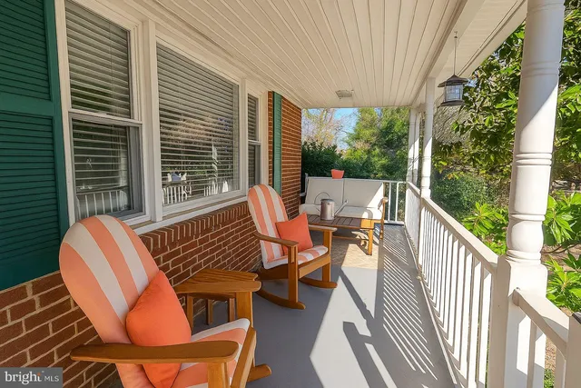a view of balcony with furniture