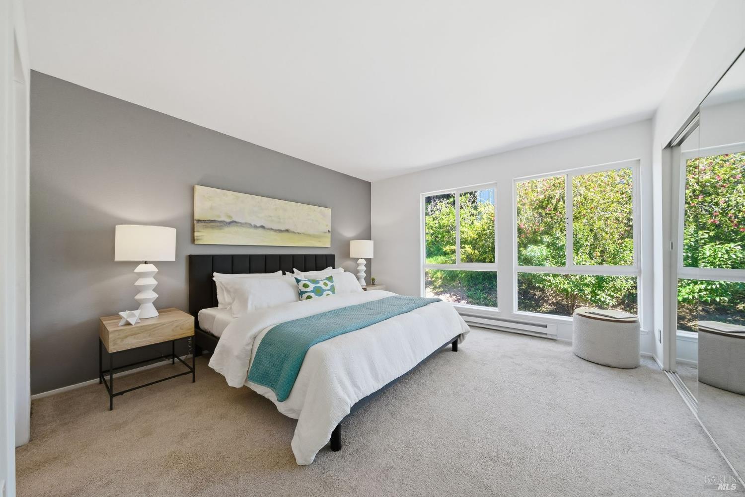 10 Professional Center Parkway, Unit 1 San Rafael, CA 94903 - Photo 23 of 35 a bed room with a bed and a couch