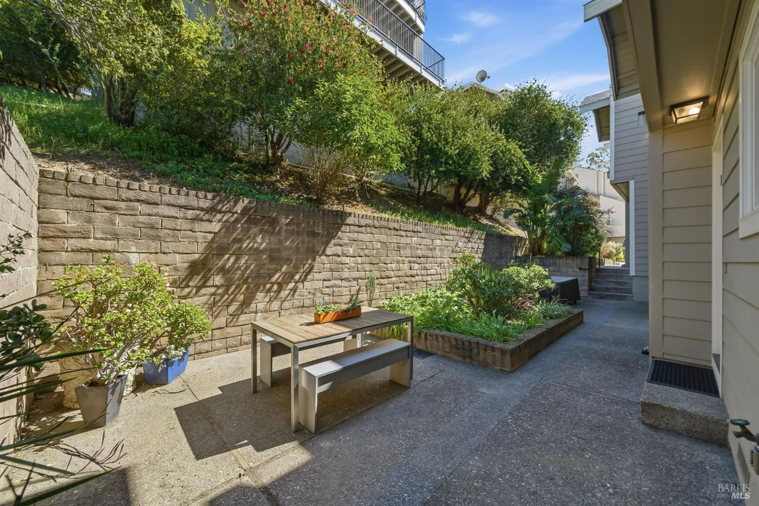 10 Professional Center Parkway, Unit 1 San Rafael, CA 94903 - Photo 30 of 35 a backyard of a house with outdoor seating