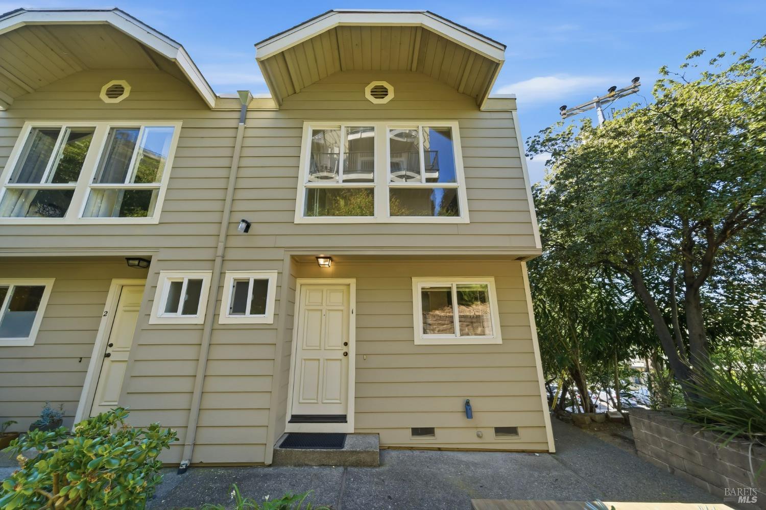 10 Professional Center Parkway, Unit 1 San Rafael, CA 94903 - Photo 31 of 35 a front view of a house with a yard