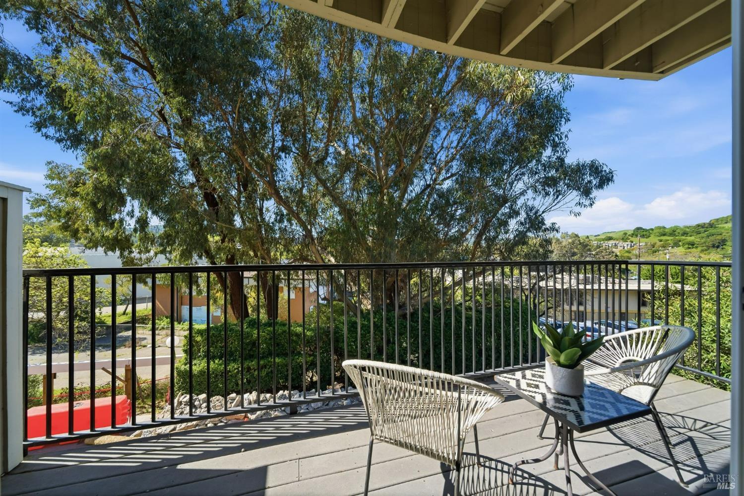 10 Professional Center Parkway, Unit 1 San Rafael, CA 94903 - Photo 6 of 35 a view of a chair and table in the balcony